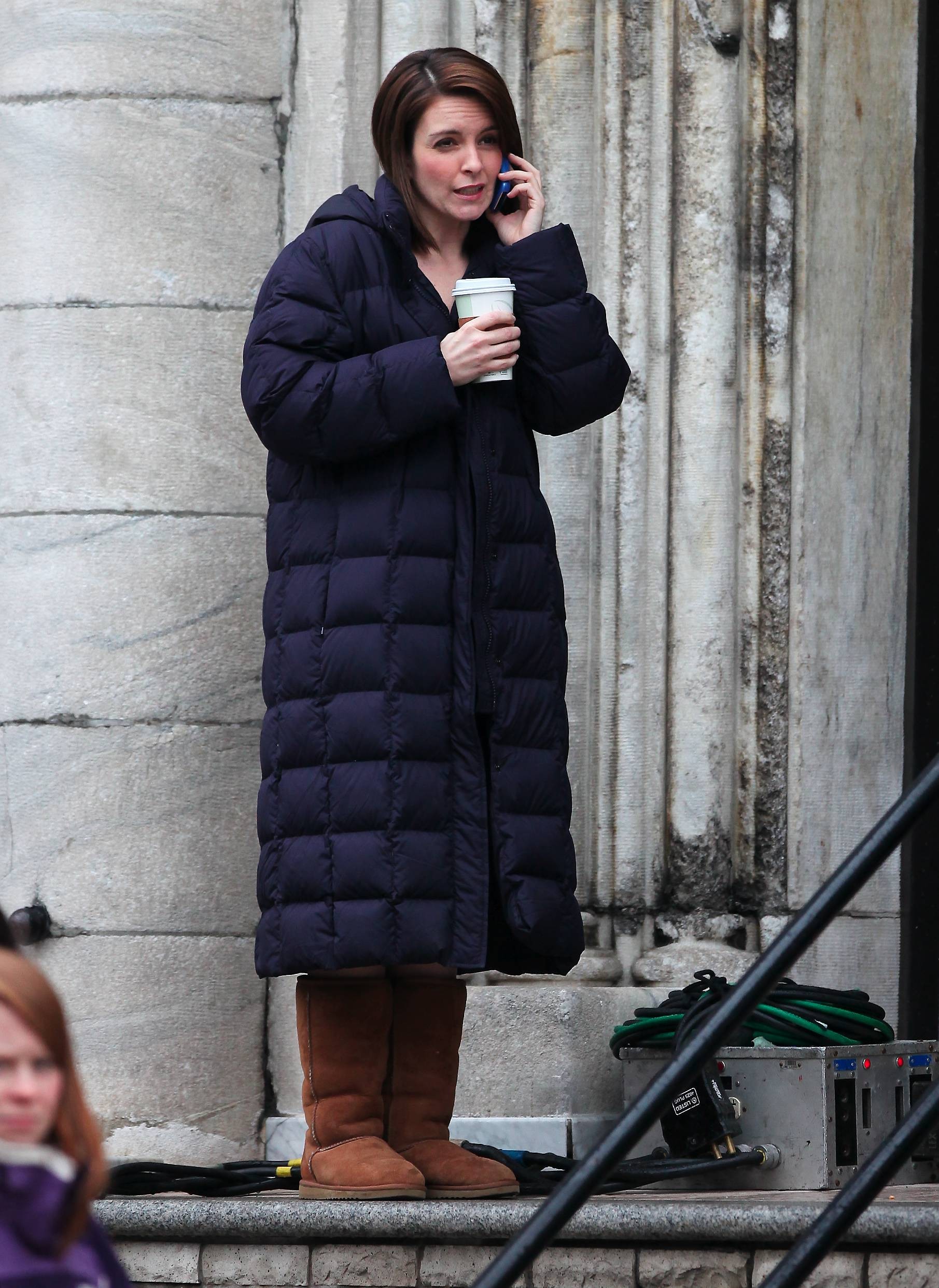 Tina Fey in black down coat and UGG boots | SHINY NYLON